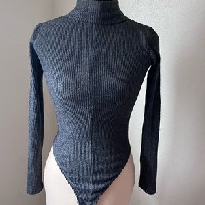 Warm and cozy grey knit turtleneck body suit